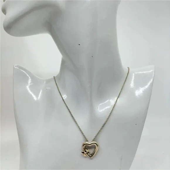 Tiffany & Co Silver Heart with 18kt Gold Ribbon Bow Necklace - Picture 10 of 11